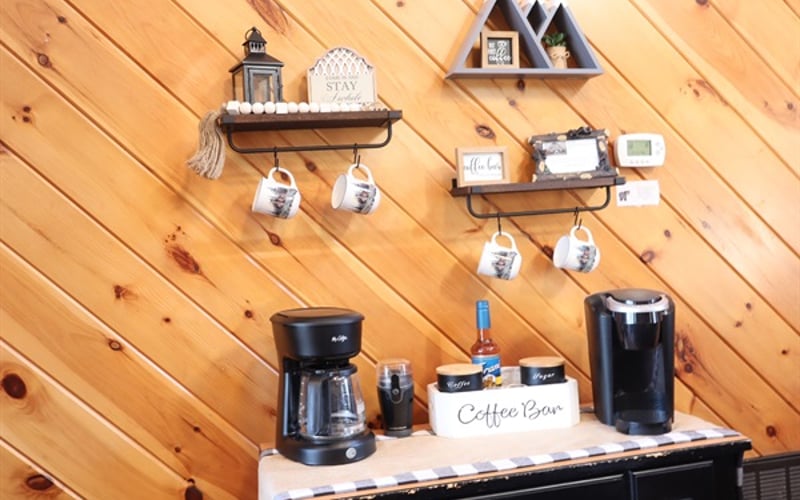 Fully loaded coffee bar: Coffee maker, Keurig, bean grinder, beans, flavored syrups, and electric kettle.   Enjoy your favorite hot drink on the private deck, while admiring the serene views!