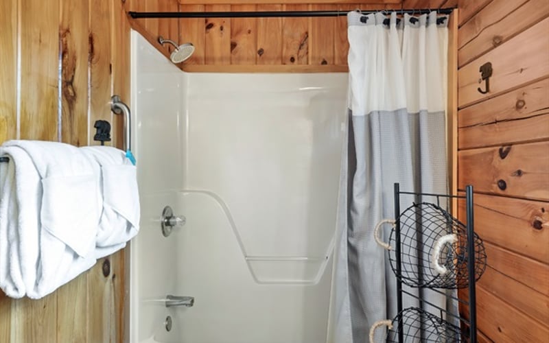 Your private en-suite retreat with a luxurious high-pressure shower with bathtub combo and plenty of space. 