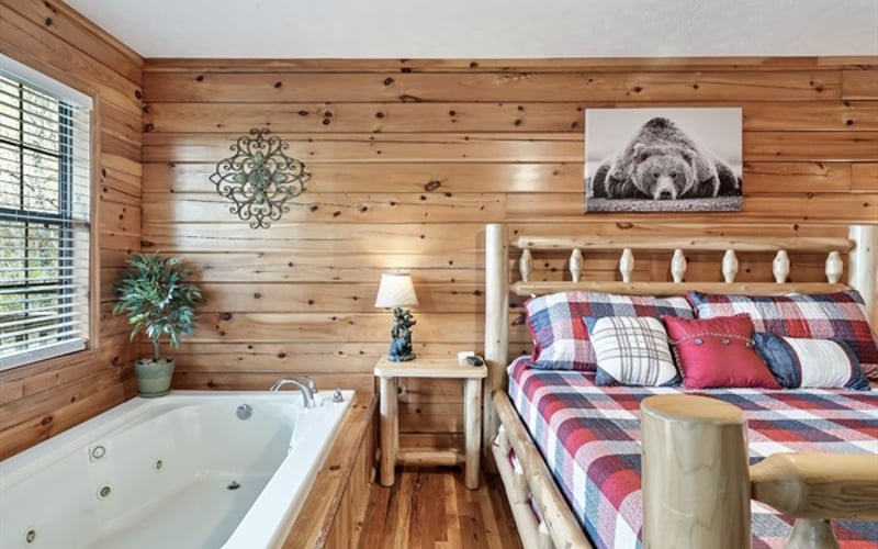 Escape the ordinary in this amazing master suite with its fireplace and private jacuzzi tub!  Enjoy a large Roku 55" TV, ensuite bathroom, and access to the spacious deck.  
