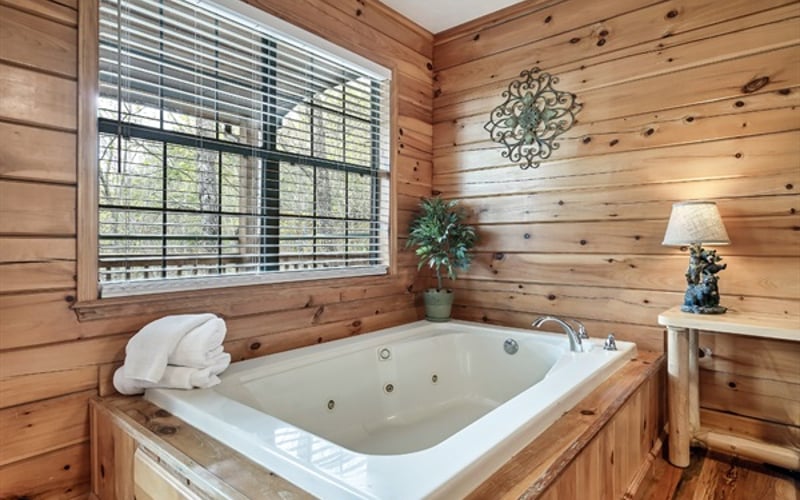 Unwind in the private jacuzzi of your mountain retreat master suite and let the stresses of everyday life melt away amidst breathtaking mountain views. 